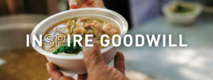 INSPIRE goodwill - giving food to someone